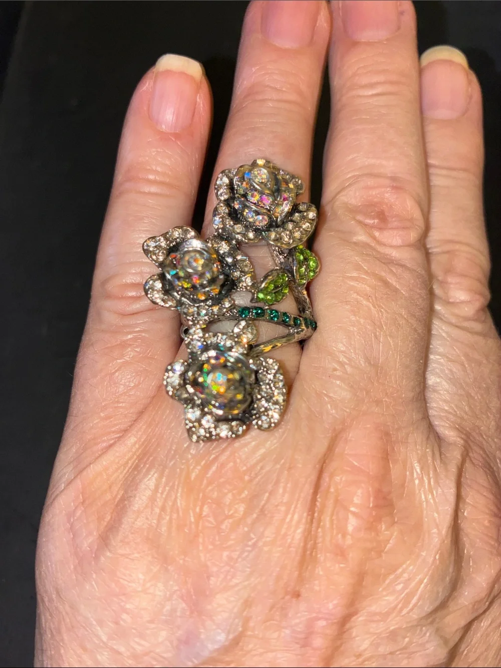 Featuring Three Crystal Rose Blooms Cocktail Stretch Ring with Green Accents